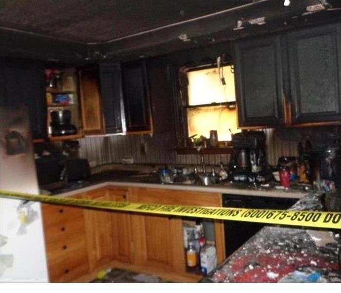 a kitchen that has been destroyed by fire 